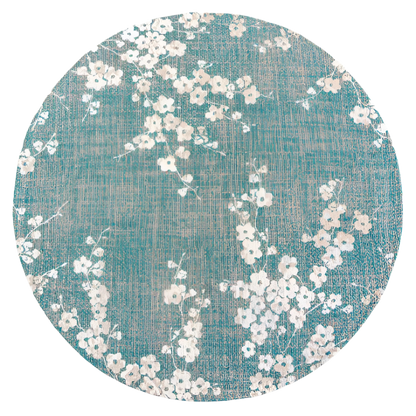 Round luxury Louis De Poortere Sakura rug with turquoise background and white floral cherry blossom design