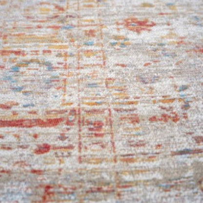 Close-up of Louis De Poortere Ushak rug showing intricate traditional patterns and muted colour palette