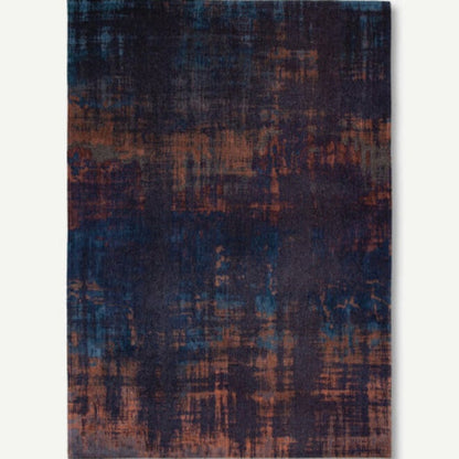 Louis De Poortere Venetian Dust rug with a rich blend of dark blue and brown shades in a textured abstract pattern