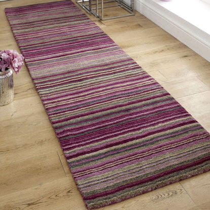 Melrose Carter stripes rug luxury runner with purple, pink and grey stripes on wooden floor