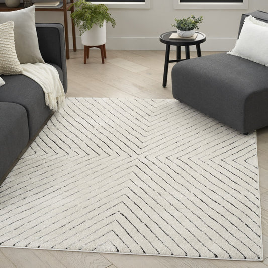Nourison Modern Comfort Chic Rug Collection with a geometric design, perfect for elegant living spaces