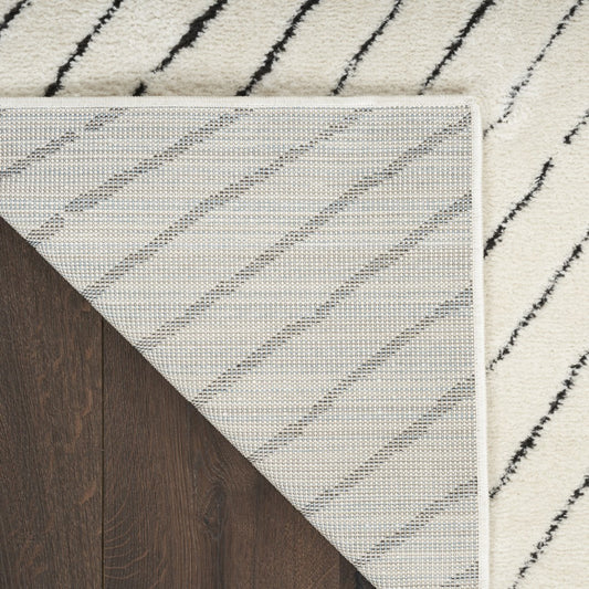 Nourison Modern Comfort Chic Rug Collection featuring a stylish striped design and soft texture