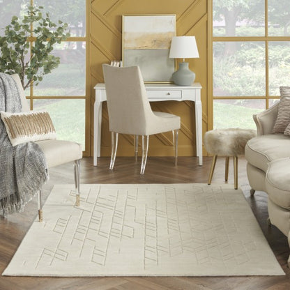 Nourison Alessia rug in a beige colour with subtle geometric patterns in a modern living room