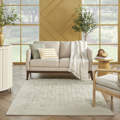 Nourison Alessia rug in a modern living room with beige sofa and light wood furniture