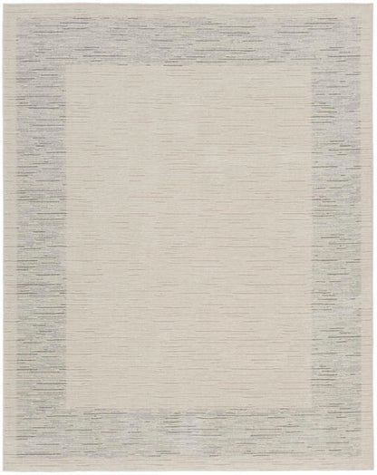 Luxury beige and grey patterned rug from the Nourison Andes Rug Collection with textured border design