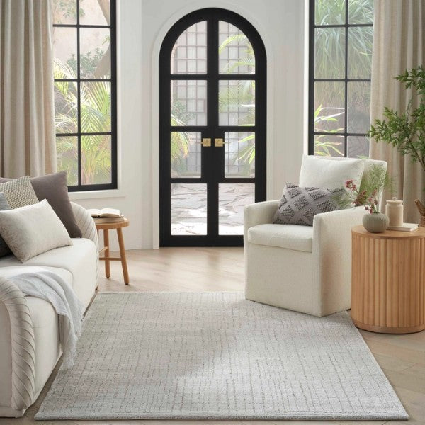 Luxury Nourison Andes Rug Collection in a modern living room with neutral sofas and natural light