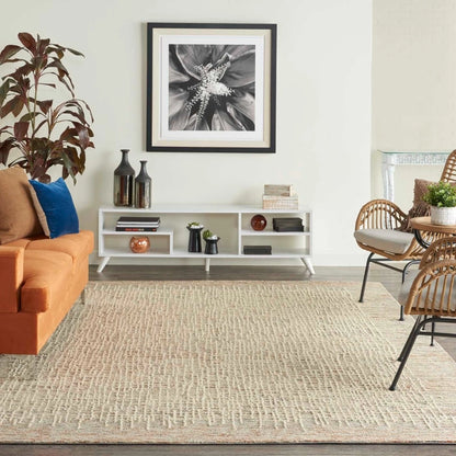 Nourison Colorado Rug Geometric Design luxury rug in beige tones placed in modern living room with sofa and chairs