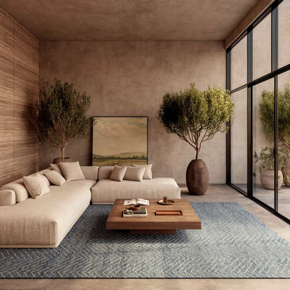 Nourison Colorado Rug Geometric Design in blue tones under wooden coffee table in modern beige living room
