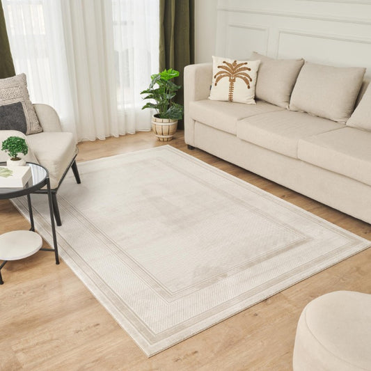 Elegant Olivia Contemporary Rug Collection in a neutral tone, enhancing a chic living room decor