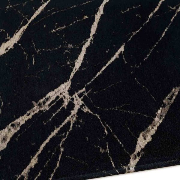 Close-up of black marble with gray veins