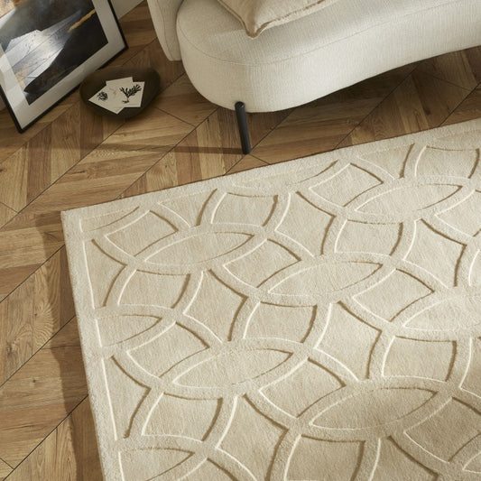 Concept Looms Priory Wool Rug Collection with elegant geometric design on a wooden floor