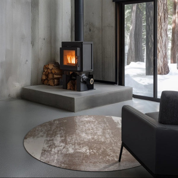 Rust Copper Easy Clean Rug placed in a cosy living room with a fire stove and modern decor