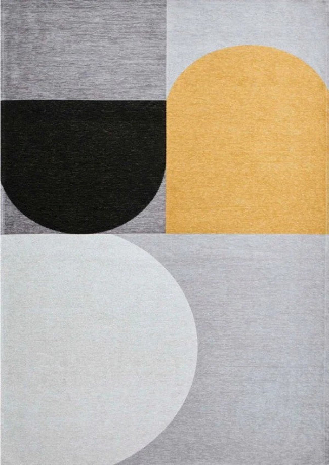 Geometric patterned rug with black, yellow, and gray shapes on a gray background