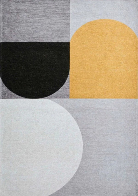 Geometric patterned rug with black, yellow, and gray shapes on a gray background