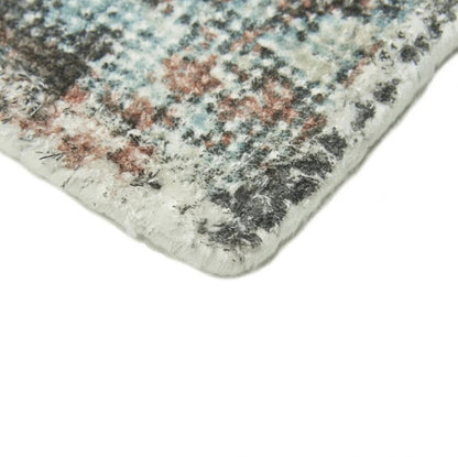 Close-up of Sintra Teal Viscose Luxury Rug showcasing its soft texture and intricate pattern