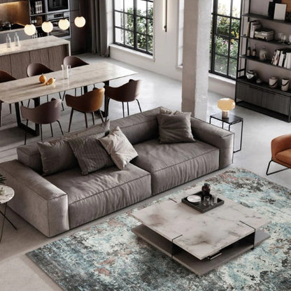 Stylish Sintra Teal Viscose Luxury Rug enhancing a modern living room with elegant furniture