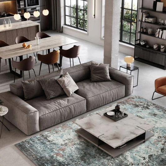 Stylish Sintra Teal Viscose Luxury Rug enhancing a modern living room with elegant furniture