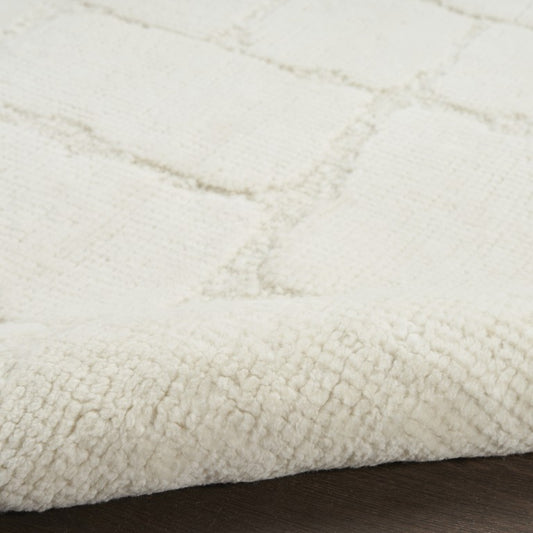 The Blanco Abstract Rug in soft cream with a textured design, perfect for enhancing modern living spaces