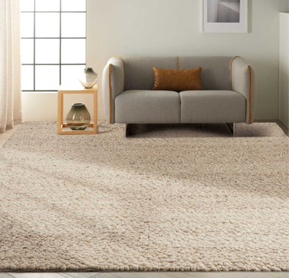 Nourison The Calvin Klein Riverstone Rug Collection in beige, ideal for modern living room decor