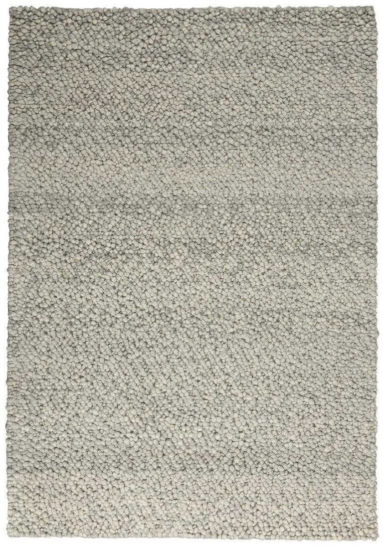 Nourison The Calvin Klein Riverstone Rug Collection in soft grey, ideal for adding luxury to any space.
