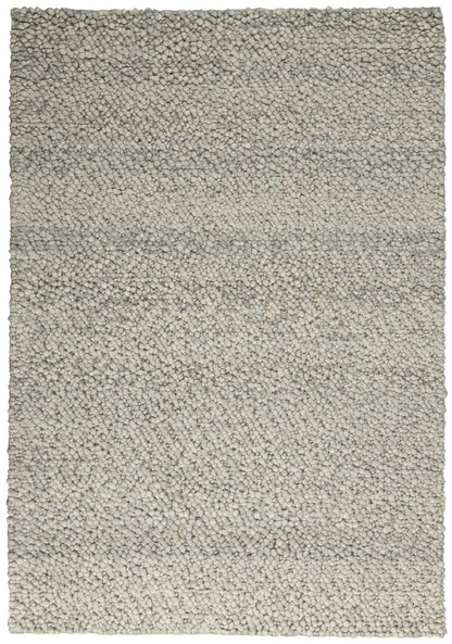 Nourison The Calvin Klein Riverstone Rug Collection in soft grey, ideal for adding luxury to any space.