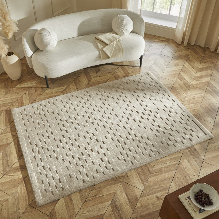 Luxury rug from The Priory Wool Collection featuring a textured design in neutral tones