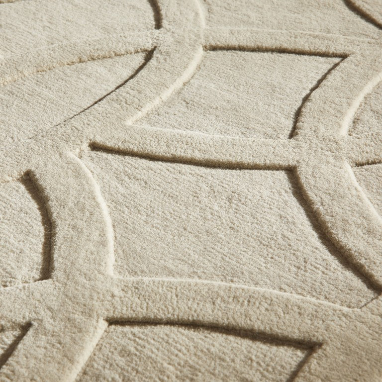 Close-up of a Luxury Rug from The Priory Wool Collection featuring a textured pattern in soft cream tones