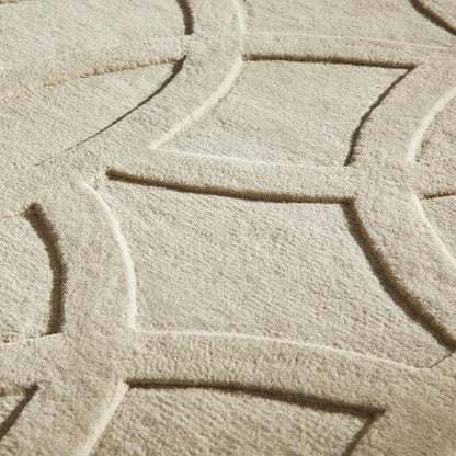 Close-up of a Luxury Rug from The Priory Wool Collection featuring a textured pattern in soft cream tones