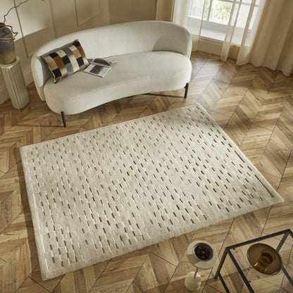 Luxury rug from Concept Looms, The Priory Wool Collection, featuring a textured design in a light beige colour