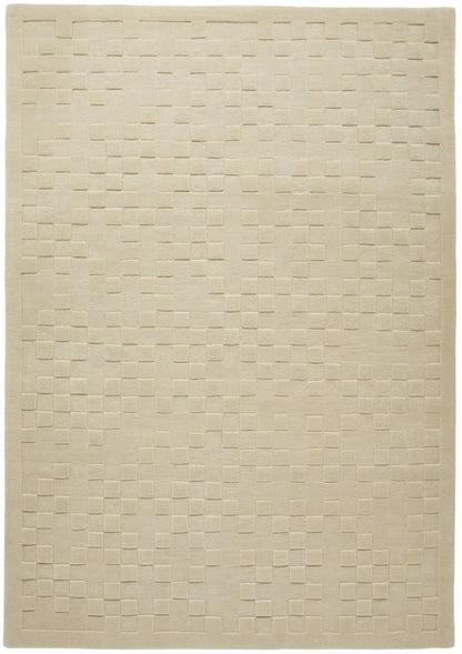 Elegant beige luxury rug from The Priory Wool Collection featuring a textured square pattern