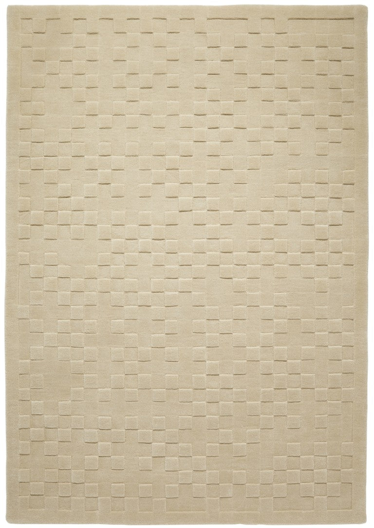 Elegant beige luxury rug from The Priory Wool Collection featuring a textured square pattern 