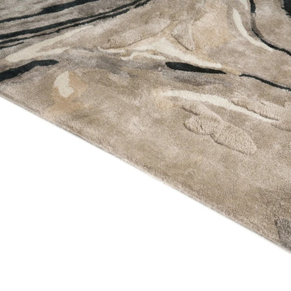 Close-up of a textured rug with abstract design on a white background