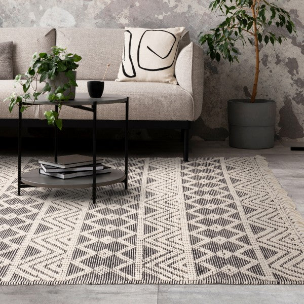 Luxury Boho Collection Asra Rug by Asiatic with geometric patterns in a modern living room