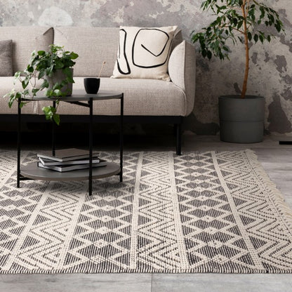 Luxury Boho Collection Asra Rug by Asiatic with geometric patterns in a modern living room