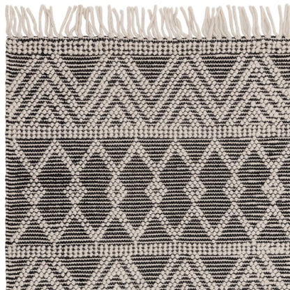 Boho Collection Asra Rug by Asiatic featuring black and white geometric patterns with textured weave and fringed edges