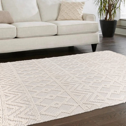 Luxury Boho Collection Asra Rug by Asiatic in cream with geometric textured pattern on wooden floor