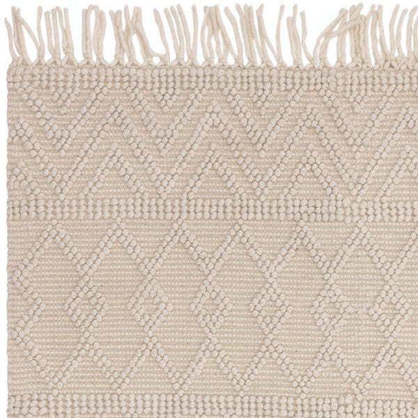 Luxury Boho Collection Asra Rug by Asiatic in beige with textured geometric patterns and fringe edges
