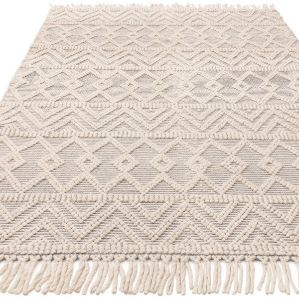 Asiatic luxury rug from Boho Collection Asra Rug in beige with textured geometric patterns and fringed edges