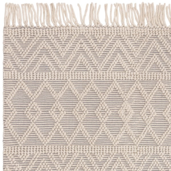 Asiatic Boho Collection Asra Rug luxury beige textured rug with geometric patterns and fringed edges