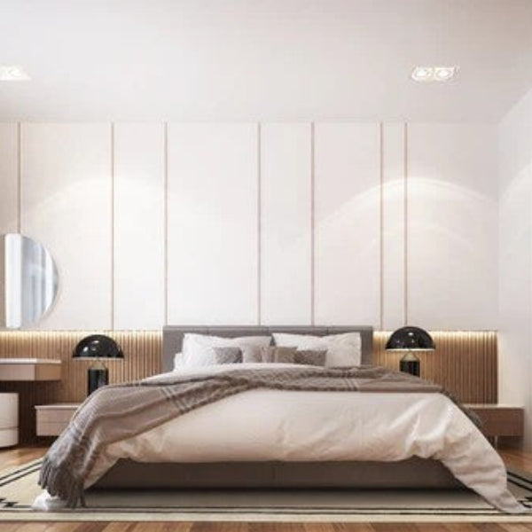 Modern bedroom with a bed, wardrobe, and desk.