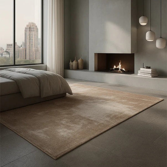 Modern living room with a fireplace, large window, and minimal decor.